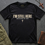I'M STILL HERE BECAUSE OF HIM T-shirt